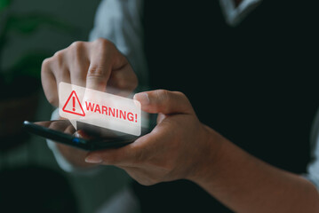 System hacked warning alert, Man using smartphone with cyber attack network, virus, spyware, scam or Malicious software. Cyber security and cybercrime. Compromised information internet - obrazy, fototapety, plakaty