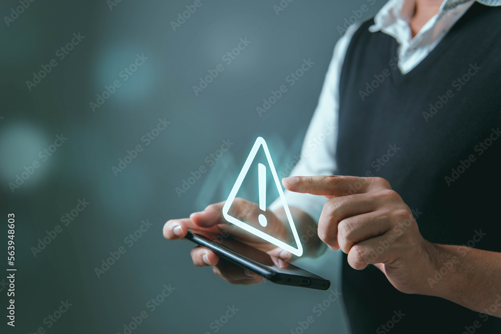 Aufkleber system hacked warning alert, man using smartphone with cyber attack network, virus, spyware, scam or