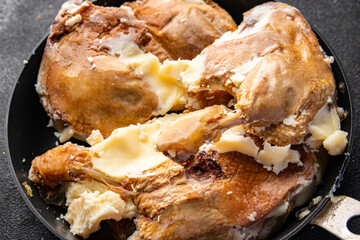 duck leg confit meat in duck fat ready to cook meal food snack on the table copy space food...