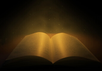 Open book. Golden dust with shining stars flies out of the book. Magical atmosphere.