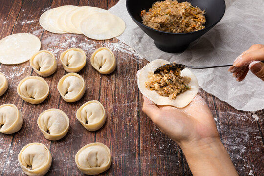 Korean handmade dumplings. Knead the flour by hand to make dumplings.