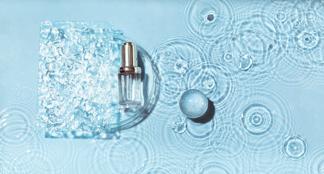 Cosmetic spa medical skincare, glass serum bottle in petri dish with collagen on blue water background with waves.