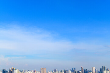 blue clear sky in summer day over the city