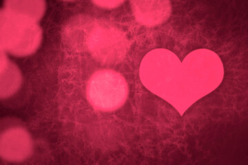 Pink heart on a grunge background