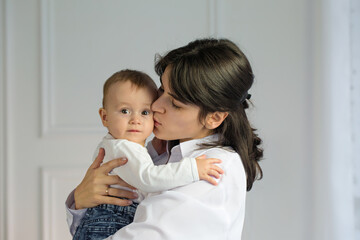 mother kisses her son