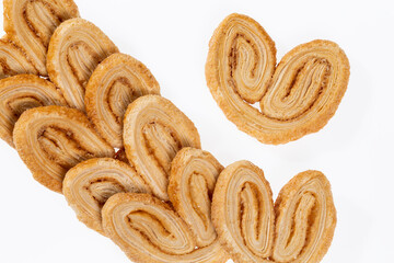 Bakery And Pastry - Tasty Puff Pastry Hearts Covered With Sugar; Photo White Background