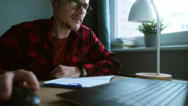 Online learning process. Student studying and take online lesson using laptop. Stock video 4k