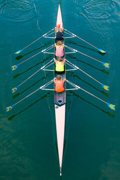 rowing boat on the Seine river with a team of  4 aboard view from above