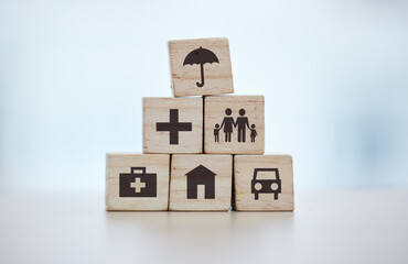 Building blocks, pyramid and life insurance for medical, car loan or home on background mockup, table or desk mock up. Zoom, wooden and cubes for house risk management, security and future protection