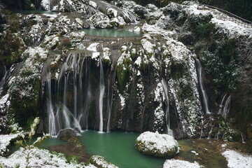 Marmore waterfall covered by the snow and hidden in the fog, Terni, Umbria, Italy