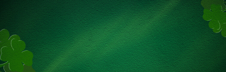 St Patricks day backdrop. Shamrocks over a dark background.