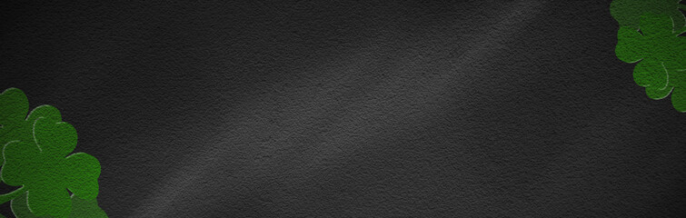 St Patricks day backdrop. Shamrocks over a dark background.