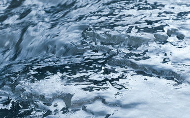 Cold blue water surface. Natural background photo
