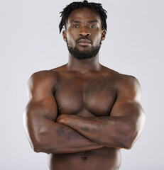 Muscle, fitness and sexy black man portrait in studio for strong body and power. Health and...