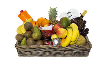 fruit basket with wine drink orange banan and others - 563979806