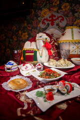 Kazakh festive table with national dishes. traditional dastarkhan