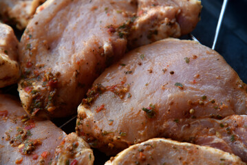 Raw pickled pork meat. Pork meat prepared for barbecue. Raw kebab. Seasoned meat.