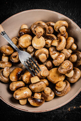 Delicious fried mushrooms in a bowl. 