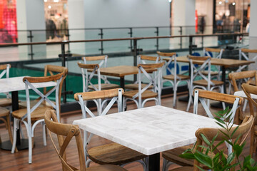 Cafe in the shopping center . interior design With chairs and tables in the store