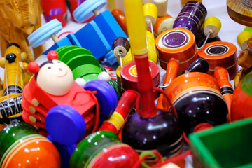 Traditional handmade Colorful toys made from wood, wooden toys, family, selective focus.