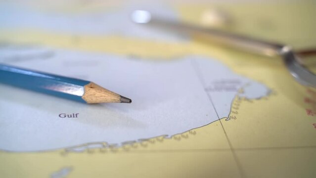 Nautical charts on the table. Slow motion