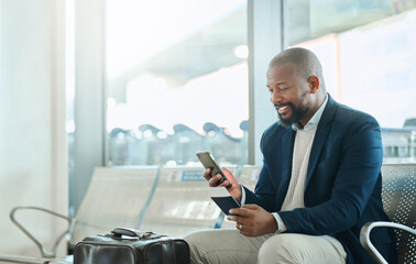 African businessman, phone and airport for texting, email or reading news on web app with passport....