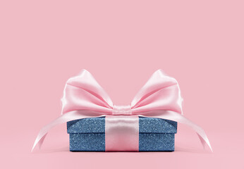 Blue glitter gift box with shining pink ribbon bow on pink background. Gift or holiday concept....