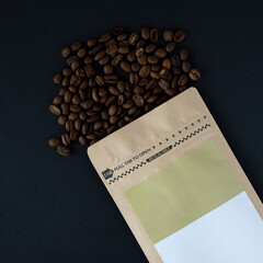 Eco-friendly Coffee bag with scattered coffee beans on black background