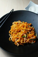Fried Thai Noodle with Pad Thai and Vegetable, Put on Wooden Table