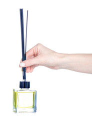 aroma diffuser, reed Diffuser in hand on white background isolation