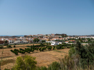 Cityscape of Silves with Moorish Castle and Cathedral on top of the hill, Algarve, Portugal