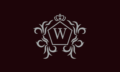 Elegant floral monogram design template for one or two letters such as W. Business sign, identity monogram for restaurant, boutique, hotel, heraldry, jewelry.