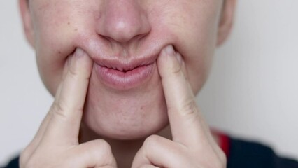 woman use silicone vacuum facial cup or hand finger for face anti wrinkle aging rejuvenation massage.millennial female remove frown wrinkles,forehead around mouth cavity,chewline around eye fine lines