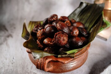 Unniyappam or Unni appam - Traditional kerala snack with rice dry coconut jaggery fried in ghee , selective focus
