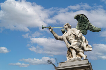 Statue of the Angel of Fame playing the trumpet on  top of the facade of the Church of Santa Maria del Giglio, more commonly known as Santa Maria Zobenigo, Venice, Italy © Simona Sirio