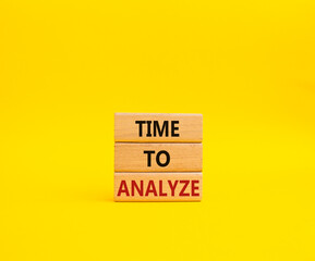 Time to Analyze symbol. Concept word Time to Analyze on wooden blocks. Beautiful yellow background. Business and Time to Analyze concept. Copy space