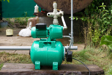 Connected pumping station mounted on a wooden board