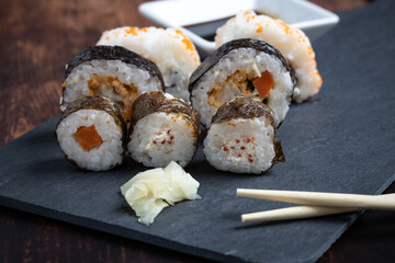 typical japanese sushi with soy sauce and chopsticks