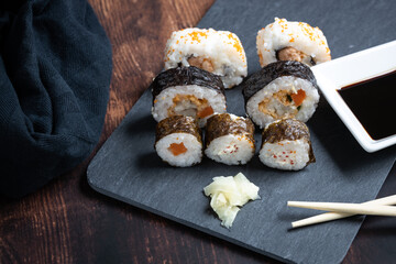 typical japanese sushi with soy sauce and chopsticks