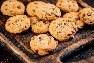 Fresh cookies with pieces of milk chocolate. 