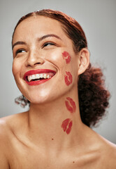 Makeup, red lipstick and kiss on face of woman model in studio for cosmetics, love and happiness....