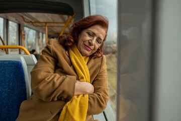 senior woman sleeping train - woman traveling on the train