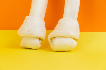 Artificial a bone for a dog with vitamins