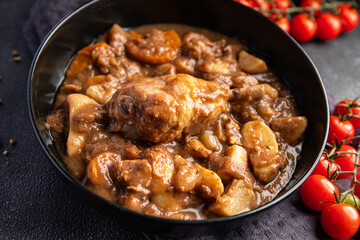 rooster in wine cuisine vegetable, cgicken meat dish meal food snack on the table copy space food background rustic top view