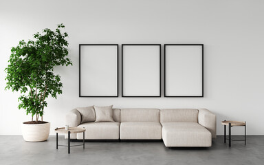Open space or modern living room with beige sofa, decorative pillows, green tree in a pot, concrete floor.Empty white frames on wall for art exhibition, mockup frame. 3d renderng