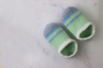 Pregnancy motherhood perenthood concept, baby shower, first birthday party banner, handmade socks, daycare, kindergarten