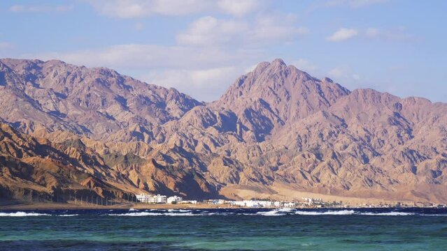 View Of The Red Sea Coast With Desert Rocky Mountains And A Small Town