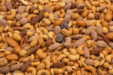 A group of almonds, pistachios, walnuts, macadamia, cashews.