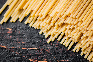 A pile of spaghetti dry on the table. 