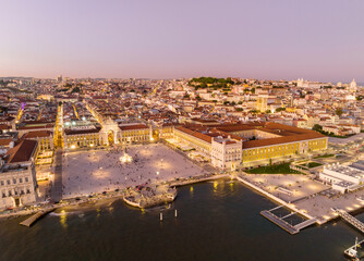 Fototapeta premium Commerce Square at night in Lisbon, Portugal. Palace Yard, Royal Palace of Ribeira. Drone Point of View